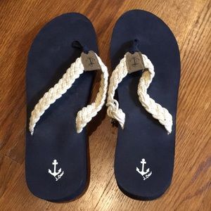 Platform flip flops; navy with white rope braid